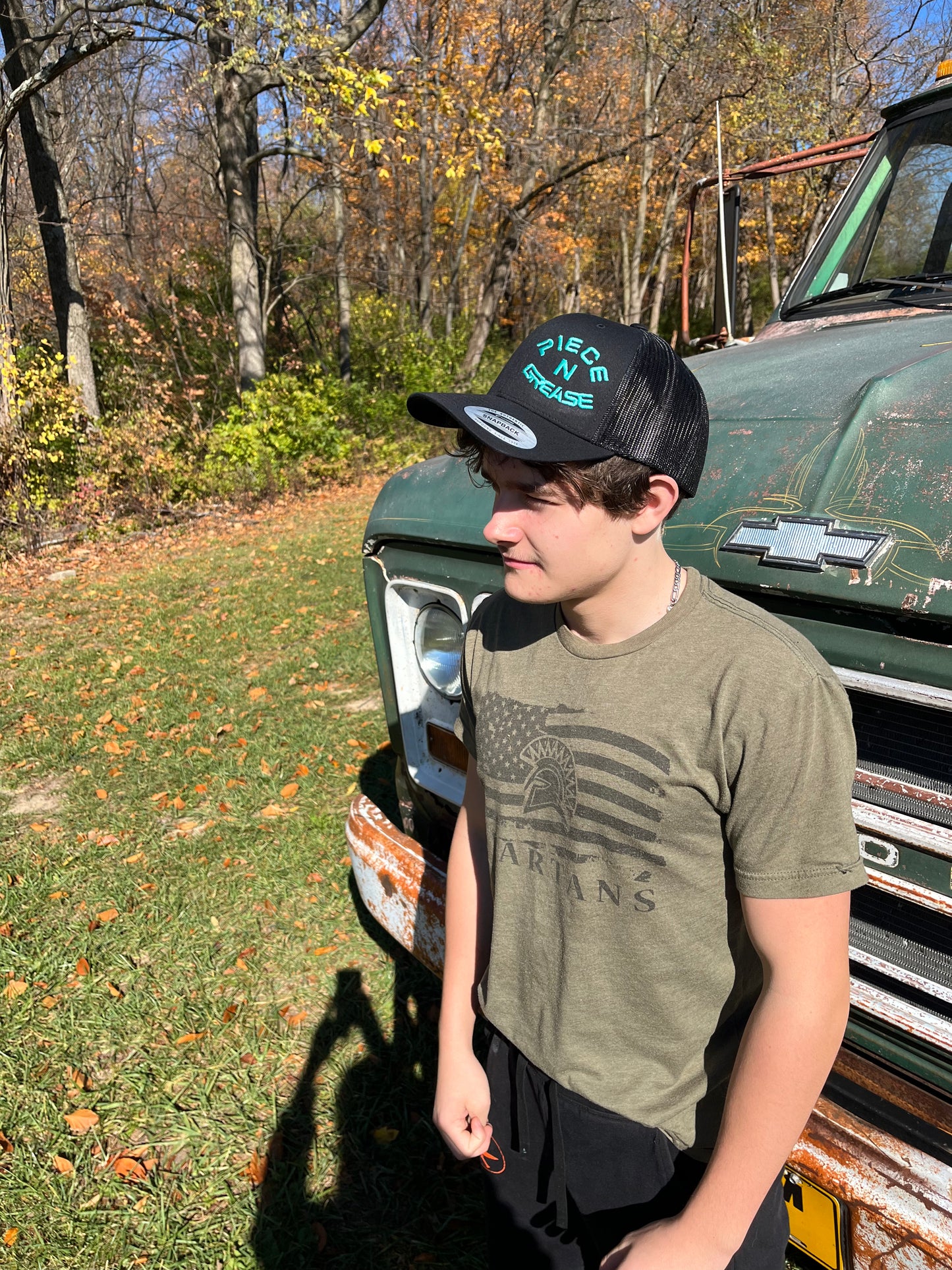 All Black w/Teal stitching P&G hat